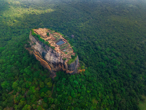 Aerial view of Sigiriya rock at misty morning, Sri Lanka. Drone footage