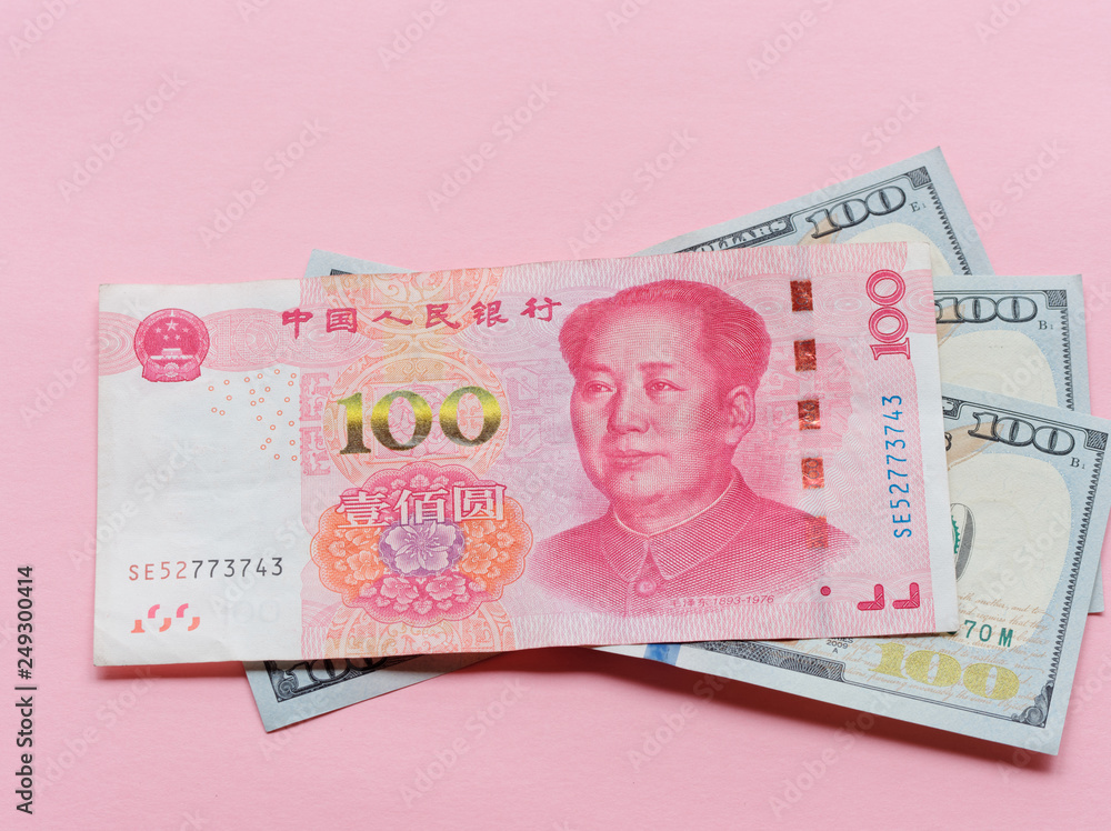 Wall mural US dollar bill and China yuan banknote macro, Chinese and USA economy finance trade business, money closeup, forex concept. 