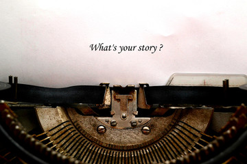 In the old typewriter inserted a white sheet of paper with the inscription: What's your story ?