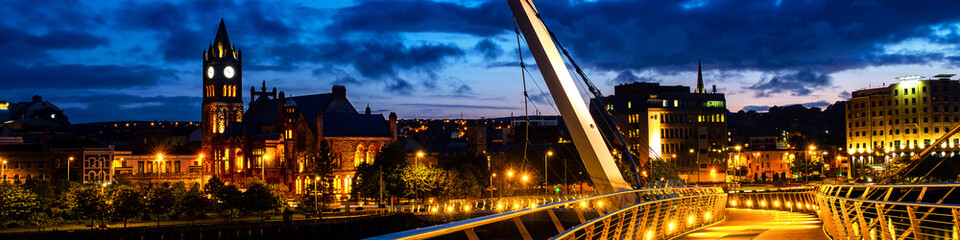 Illuminated Peace bridge in Derry Londonderry in Northern Ireland