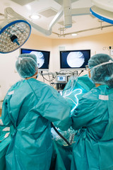 Team of surgeons operating in the hospital