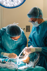 Team of surgeons operating in the hospital