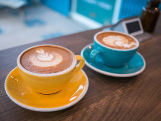Hot coffee late art in cup