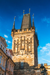 Fototapeta premium Lesser Town Bridge Tower in Prague at sunset, Czech Republic, Europe.