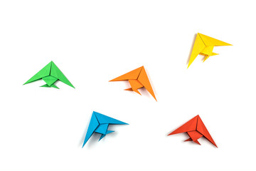 Paper origami fishes isolated on white background.