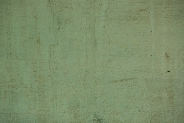 concrete wall as background, paint green