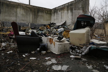 Environmental problems and nature pollution. Waste dumped in the city, an illegal social issue. Rubbish, garbage, outdoor, city, landscape, city space, abandoned