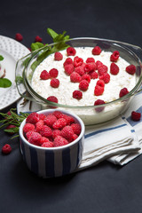 Curd-chocolate dessert without sugar with fresh raspberries and mint. Healthy eating. The concept of a healthy diet.