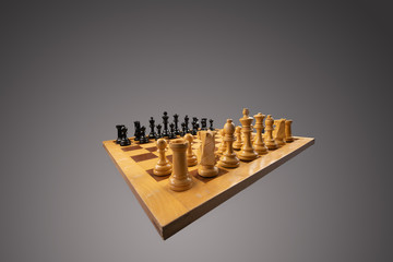 White and black chess pieces  placed on a chessboard