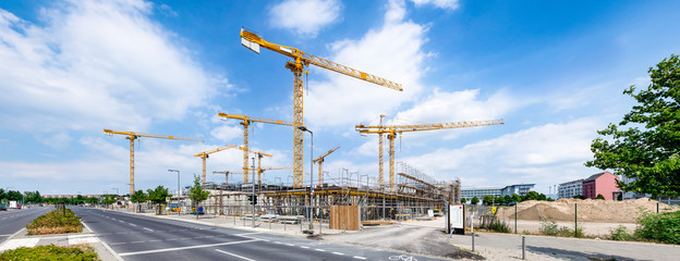 Fototapety  Duży plac budowy z dźwigami jako panorama przemysłowa