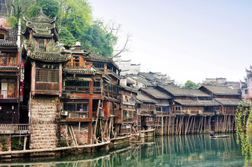 The spectacular landscape of the Diaojiaolou (traditional Chinese gabled wooden houses built on stilts) be preserved  in Fenghuang old city (Phoenix Ancient Town),Hunan Province, China.
