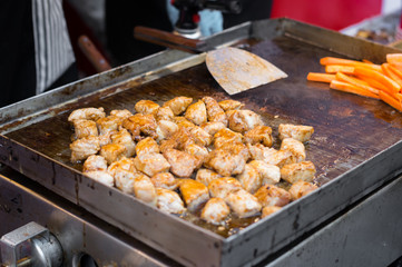 Grilled pork or meat in market.