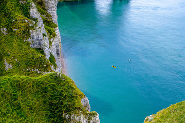 Naklejka na ściany i meble Scenic alabaster chalk cliffs of Etretat and coast of Atlantic ocean, travel and vacation destination in Normandy, France