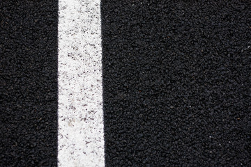 Beautiful pedestrian walk with white line on it.