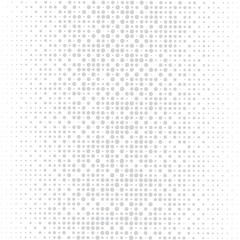 The grey dots of different sizes have different density on white background