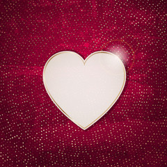 Heart frame on a red grunge texture