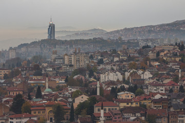 Obraz premium View from the high point to Sarajevo in the mist in the morning. Bosnia and Herzegovina