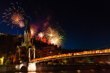 Fototapeta premium Fireworks lit up night sky over Saone River, Lyon