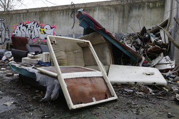 Environmental problems and nature pollution. Waste dumped in the city, an illegal social issue. Rubbish, garbage, outdoor, city, landscape, city space, abandoned