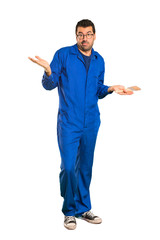 A full-length shot of a Painter man unhappy and frustrated with something because not understand something on isolated white background