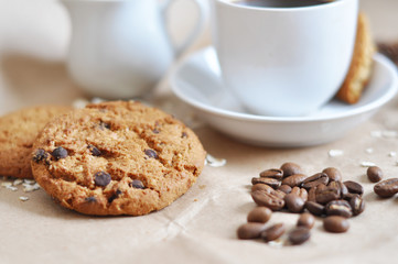 cup of coffee and chocolate chips cookies