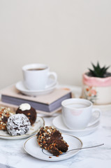 cup of coffee and sweet tasty cake