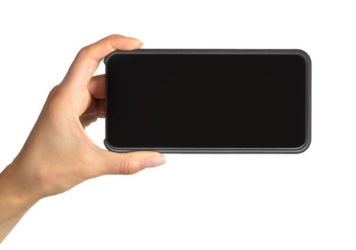 Women's hand showing black smartphone, concept of taking photo or selfie