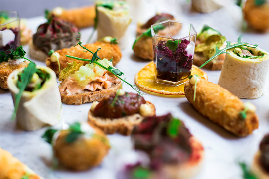 Appetizers table with different antipasti snacks - Powered by Adobe