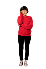 A full-length shot of a Short hair girl with red sweater having doubts over isolated white background