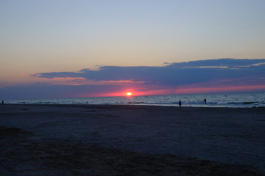 sunset at the beach sea strit