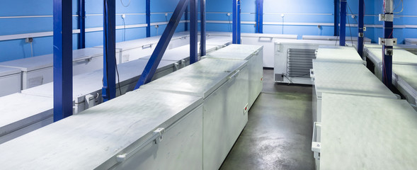 Warehouse with white refrigerators