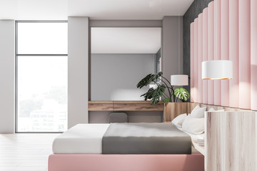 Side view of pink and gray bedroom