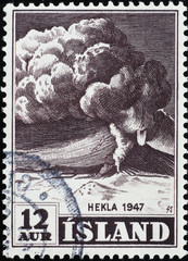 Vulcan Hekla erupting on vintage icelandic stamp