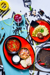 Russian cuisine lunch set. Soup, mashed potato and beef patty.