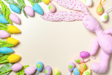 Fototapeta na wymiar Easter eggs, tulips and bunny