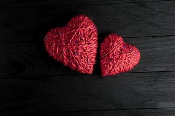 Obraz na płótnie Canvas Love hearts on wooden texture background. Valentines day card concept. Heart for Valentines Day Background.