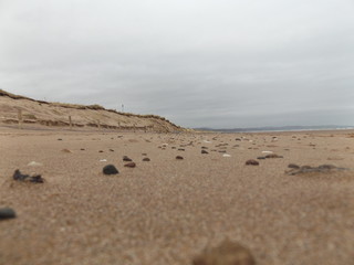 Fototapeta na wymiar stones on sand 