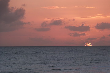 Naklejka na ściany i meble Sunrise over the sea