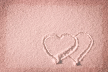 Heart drawn on the snow - composition with copy space, lettering template, text, design. Postcard template. The concept of the holiday.