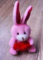 A souvenir, a gift for Valentine's day. Cute rabbit with heart