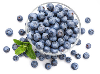 Berry blueberry with leaf mintclose-up. Fruity still life for organic healthy food, isolated on white background, Top view.