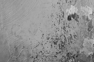 Plaster work on a wall showing the textured finish - In black and white