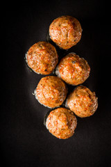 top view closeup baked roll with mushrooms, tomatoes and cheese sauce