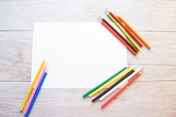 Obraz premium color pencils and paper background