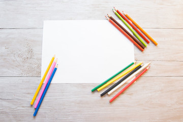 color pencils and paper background