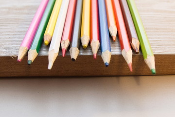 Obraz premium color pencils and paper background