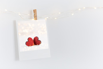 Photo on white wall. Photography heart, vintage postcards and retro styles.