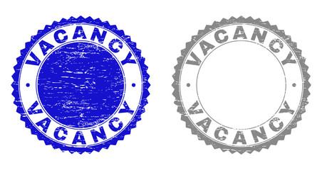Grunge VACANCY stamp seals isolated on a white background. Rosette seals with grunge texture in blue and grey colors. Vector rubber stamp imprint of VACANCY caption inside round rosette.