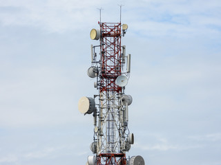 Kuala Lumpur, Malaysia - February 13, 2019 : Telecommunications or Communication transmitter tower with blue sky. Selective focus and crop fragment