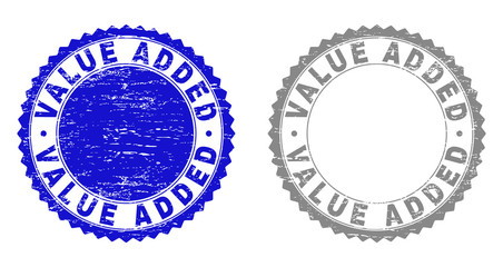 Grunge VALUE ADDED stamp seals isolated on a white background. Rosette seals with distress texture in blue and gray colors. Vector rubber stamp imitation of VALUE ADDED text inside round rosette.